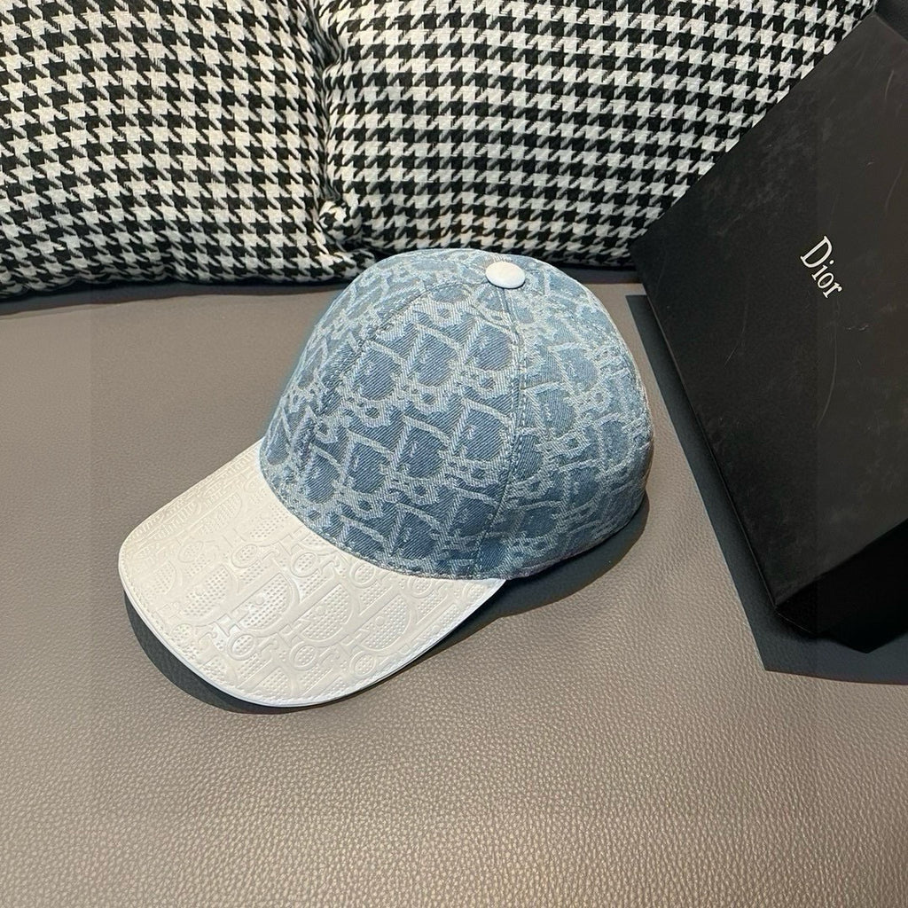 Dior cap with blue patterned crown and white textured brim, angled view