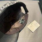 Dior cap interior with stitched lining and adjustable fabric strap.