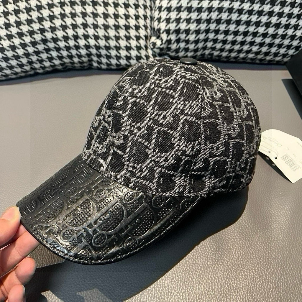 Dior baseball cap front view with black and gray monogram fabric.