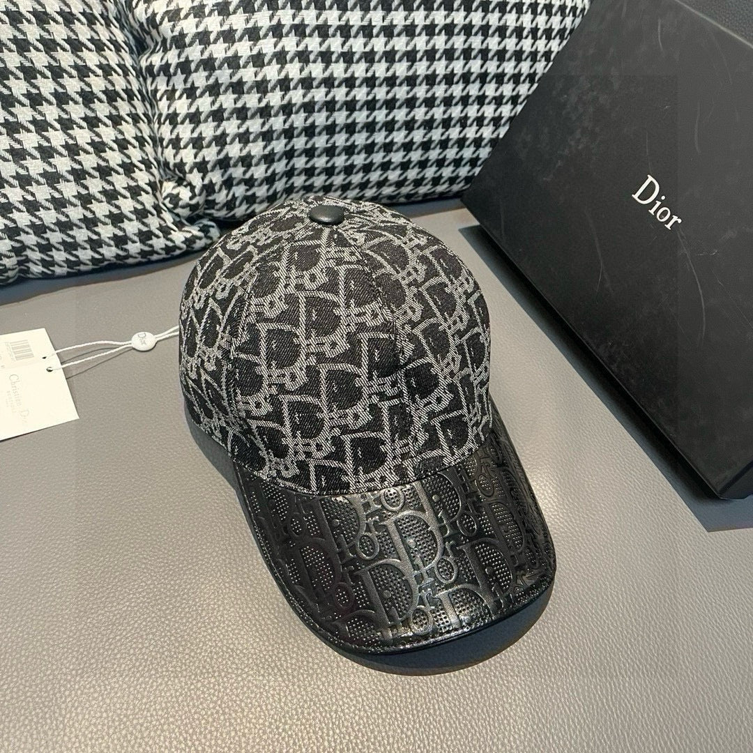Dior baseball cap with gray monogram top and dark perforated brim.