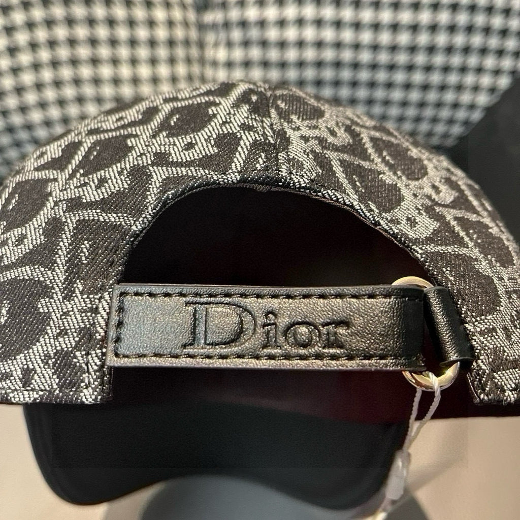 Dior cap interior with 'Dior' leather band and stitched brim edge.