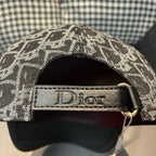 Dior cap interior with 'Dior' leather band and stitched brim edge.