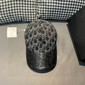 Dior baseball cap, black and gray monogram pattern, dark brim.