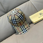 Plaid baseball cap with button top and curved brim; beige, black, white, red