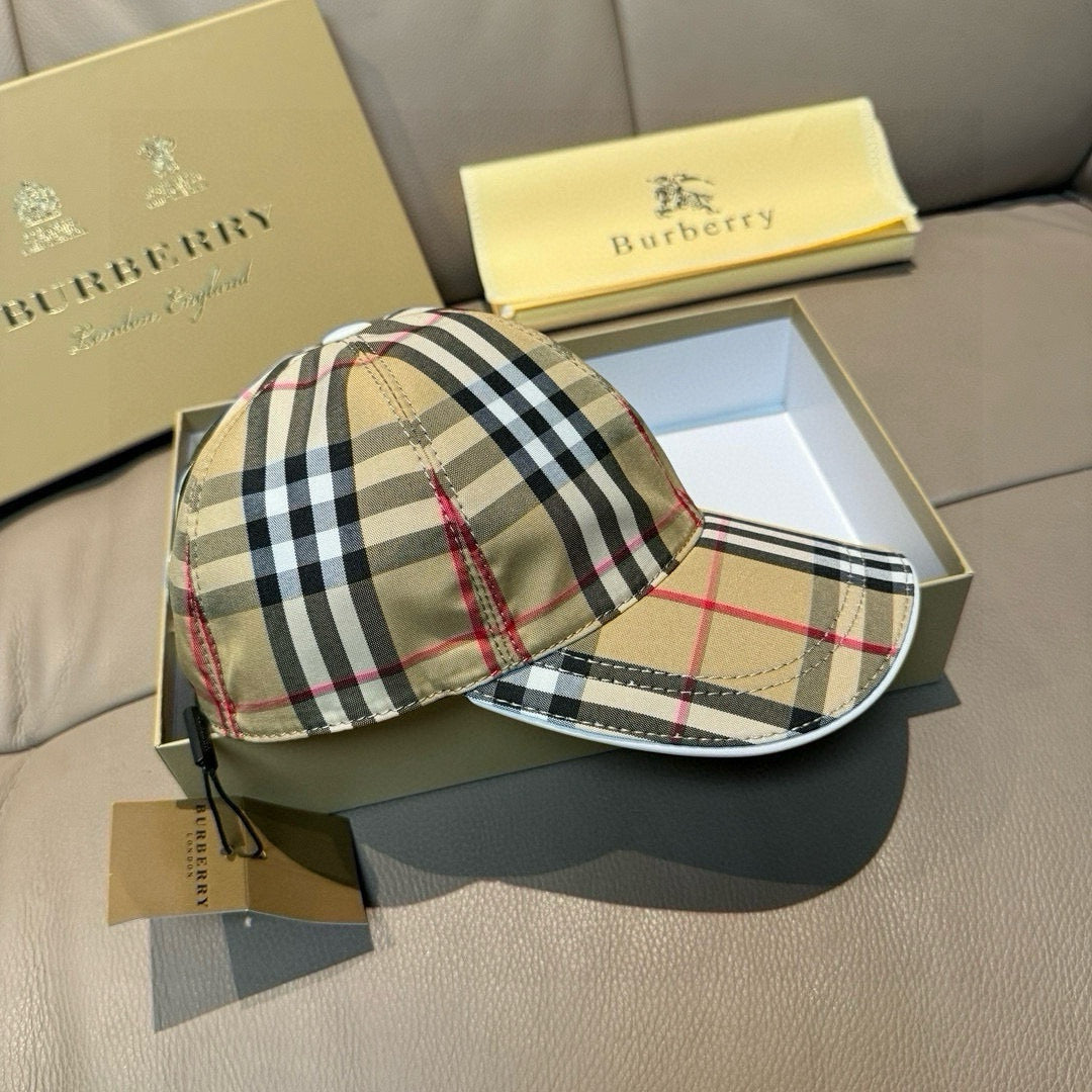 Plaid baseball cap front view with curved brim; beige, black, white checks and red