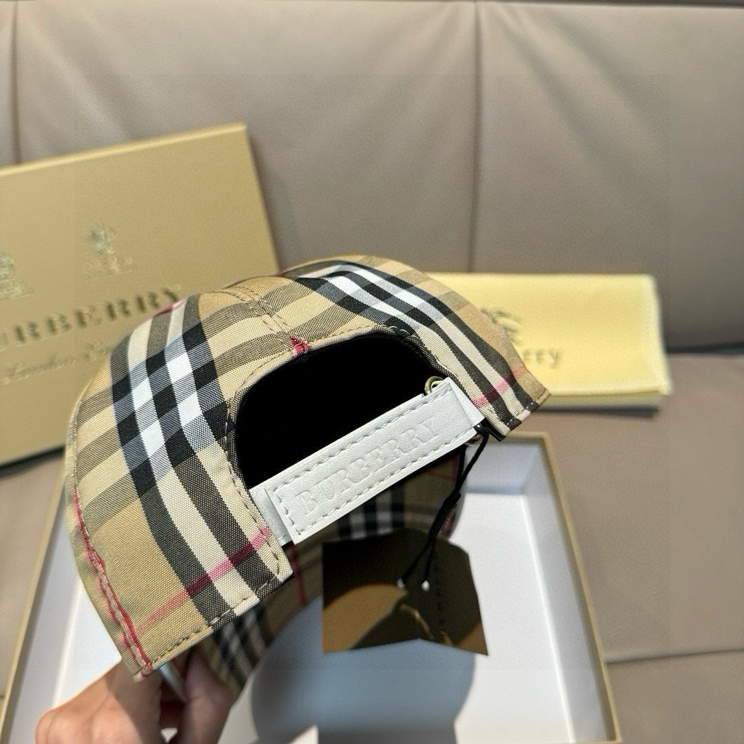 Plaid baseball cap with black inside and white strap adjuster; beige, black, red
