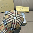 Plaid baseball cap with top button; beige, black, white checks and red trim