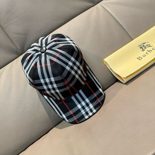 Plaid baseball cap with black, white, and red stripes; curved brim and metal button