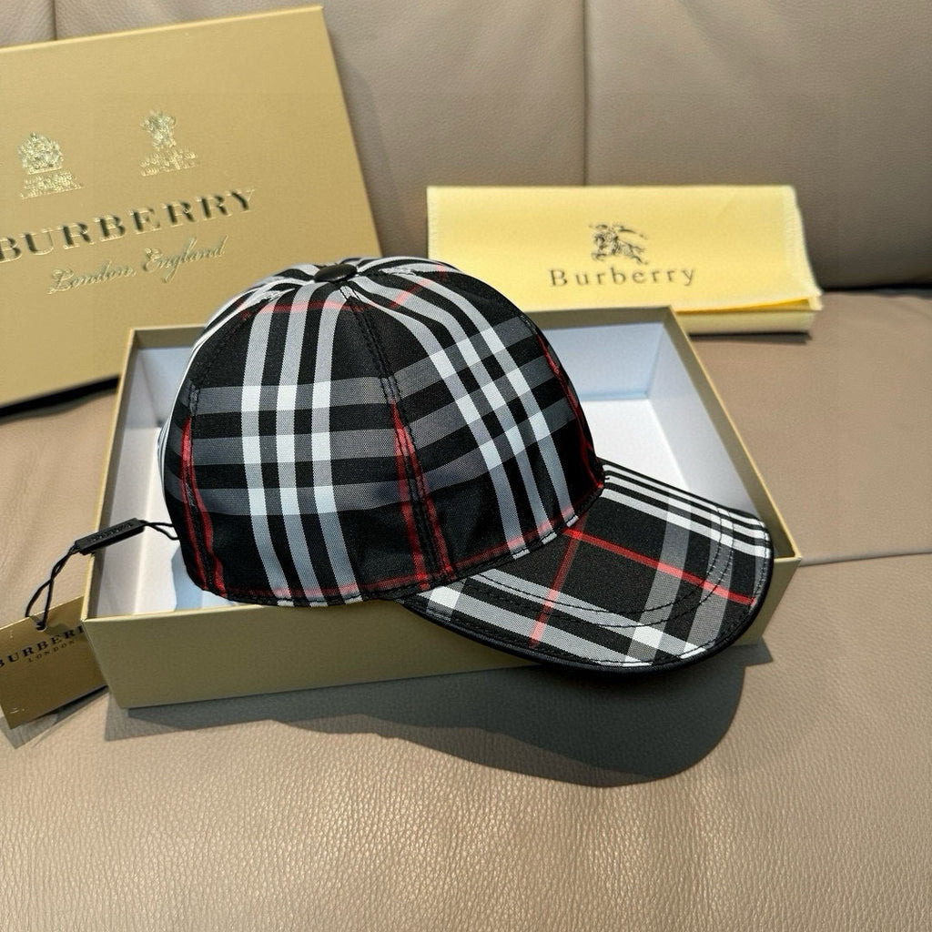 Plaid baseball cap with black, white, and red check pattern; curved brim and button top