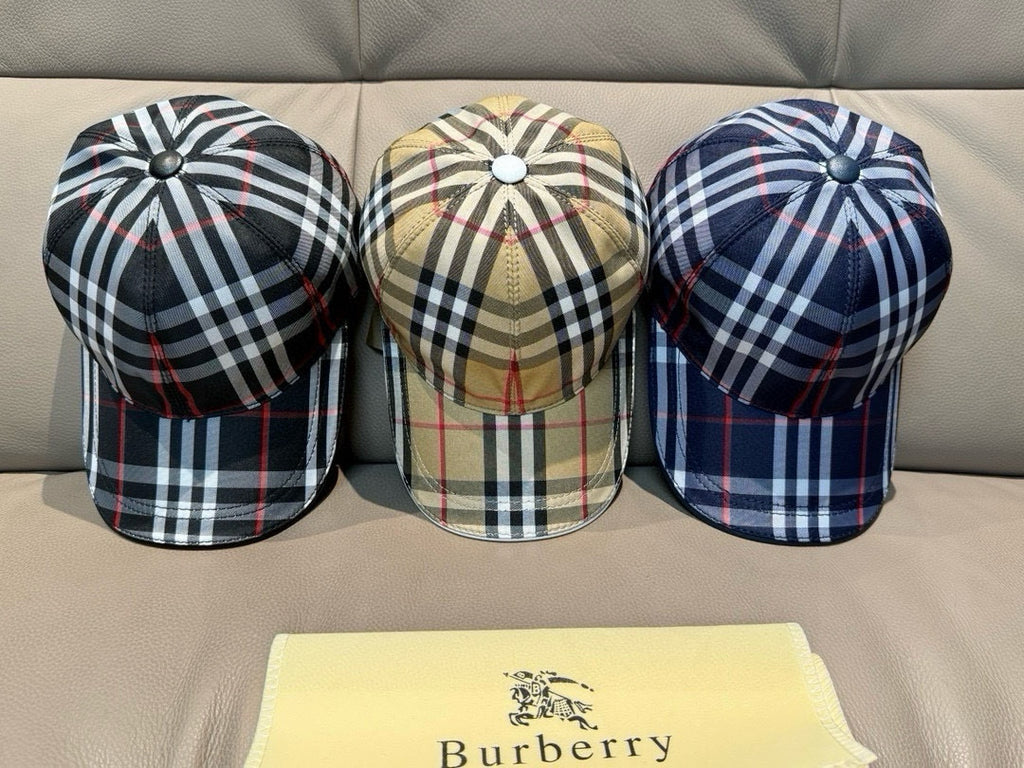 Three plaid baseball caps: navy, beige, and dark multi-color checks