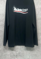 Black long-sleeve shirt full view with Balenciaga logo print at center