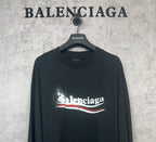 Black long-sleeve shirt with large Balenciaga logo print on chest