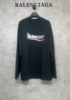 Black long-sleeve shirt with Balenciaga logo print at chest