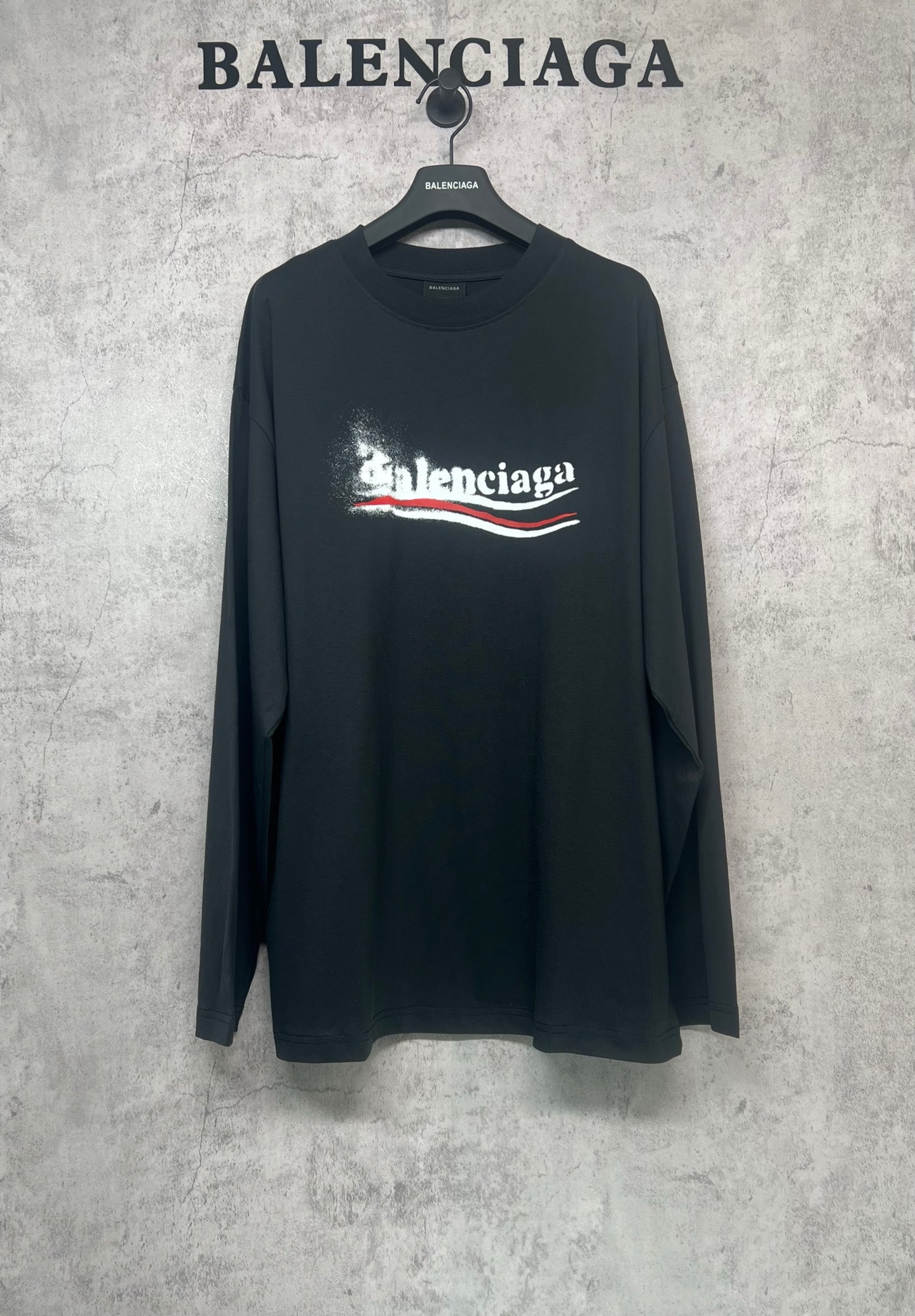 Black long-sleeve shirt with Balenciaga logo print at chest