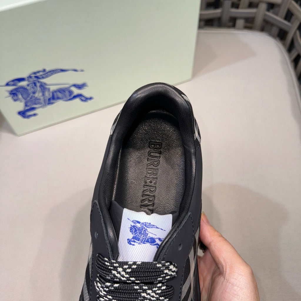 Burberry black sneaker heel with printed insole label, close-up