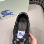 Burberry black sneaker heel with printed insole label, close-up