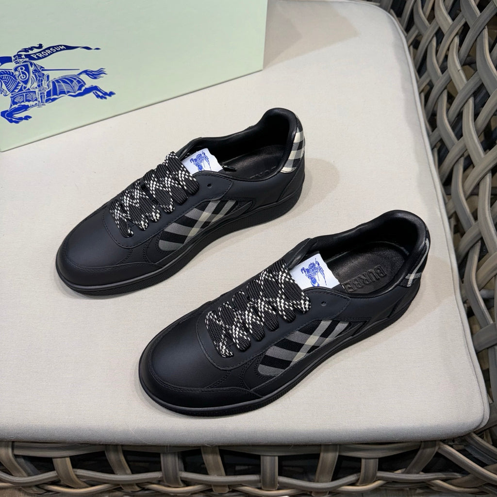 Burberry black sneakers with check-pattern laces and plaid accents, side view