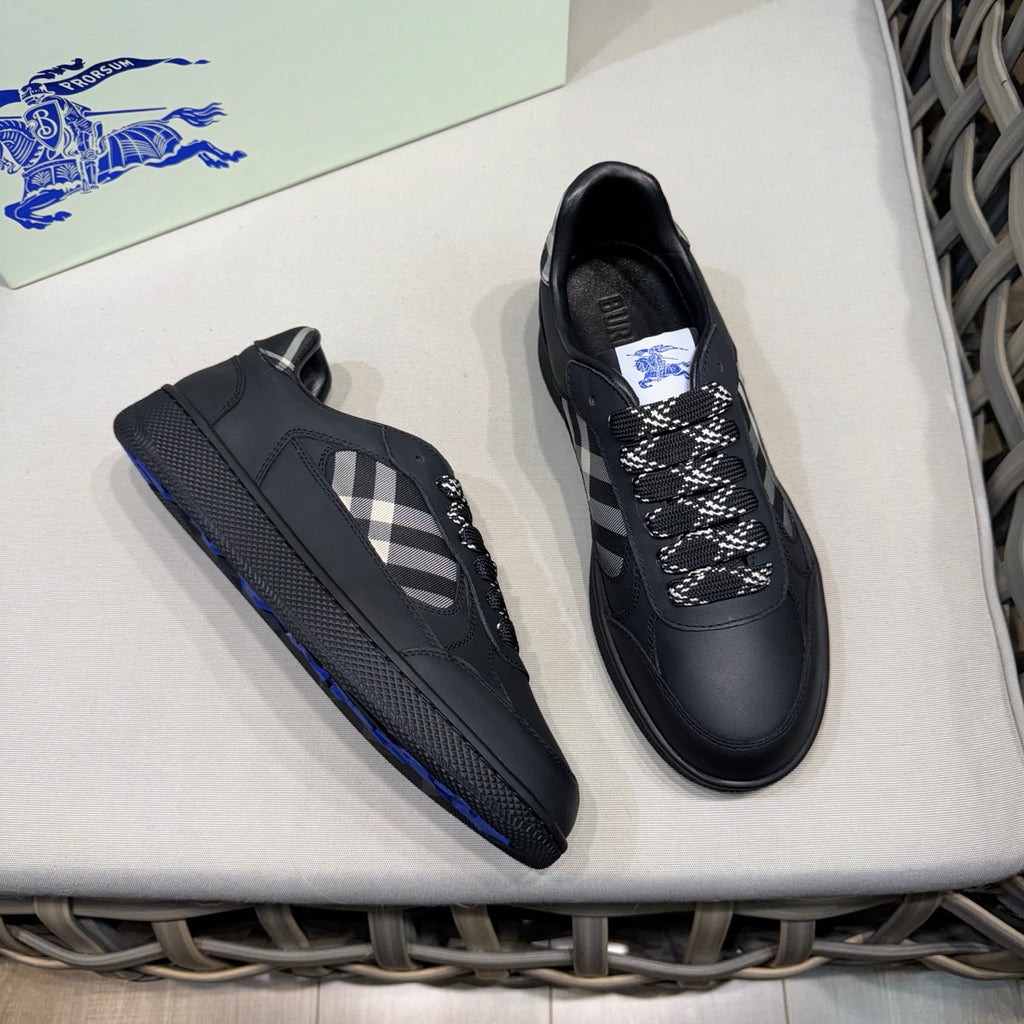 Burberry black sneakers with plaid side stripe and check laces, side view