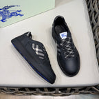 Burberry black sneakers with plaid side stripe and check laces, side view