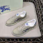 Burberry low-top sneakers showing side profile with beige leather and check detail