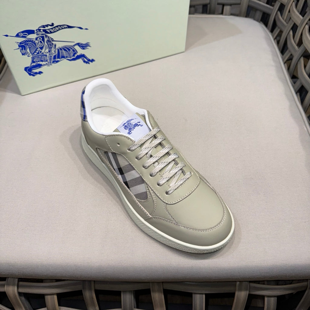 Burberry low-top sneaker single view with beige leather, blue laces, and check overlay