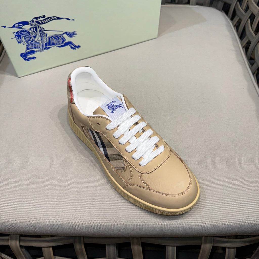 Beige low-top sneaker with white laces and black-and-white check side panel