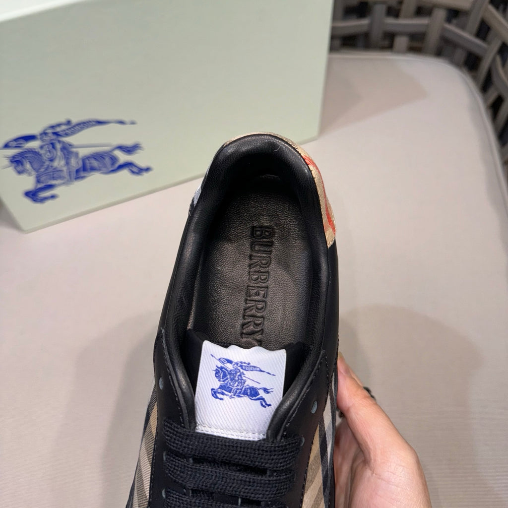 Black low-top sneaker tongue lining with Burberry logo stamp