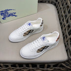 White leather lace-up sneakers with check side panels and blue logo