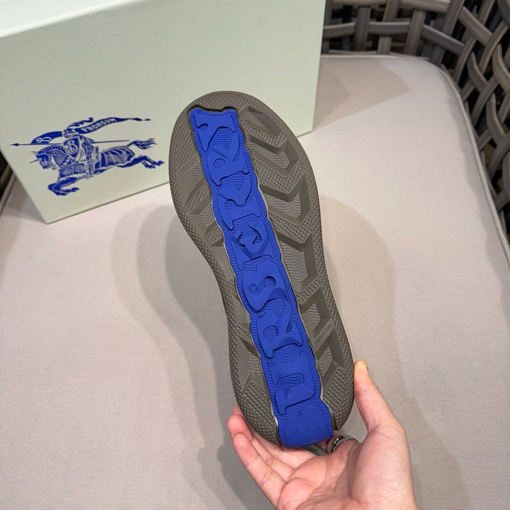 Burberry sneaker outsole, gray rubber with blue tread and patterned grip