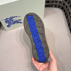 Burberry sneaker outsole, gray rubber with blue tread and patterned grip