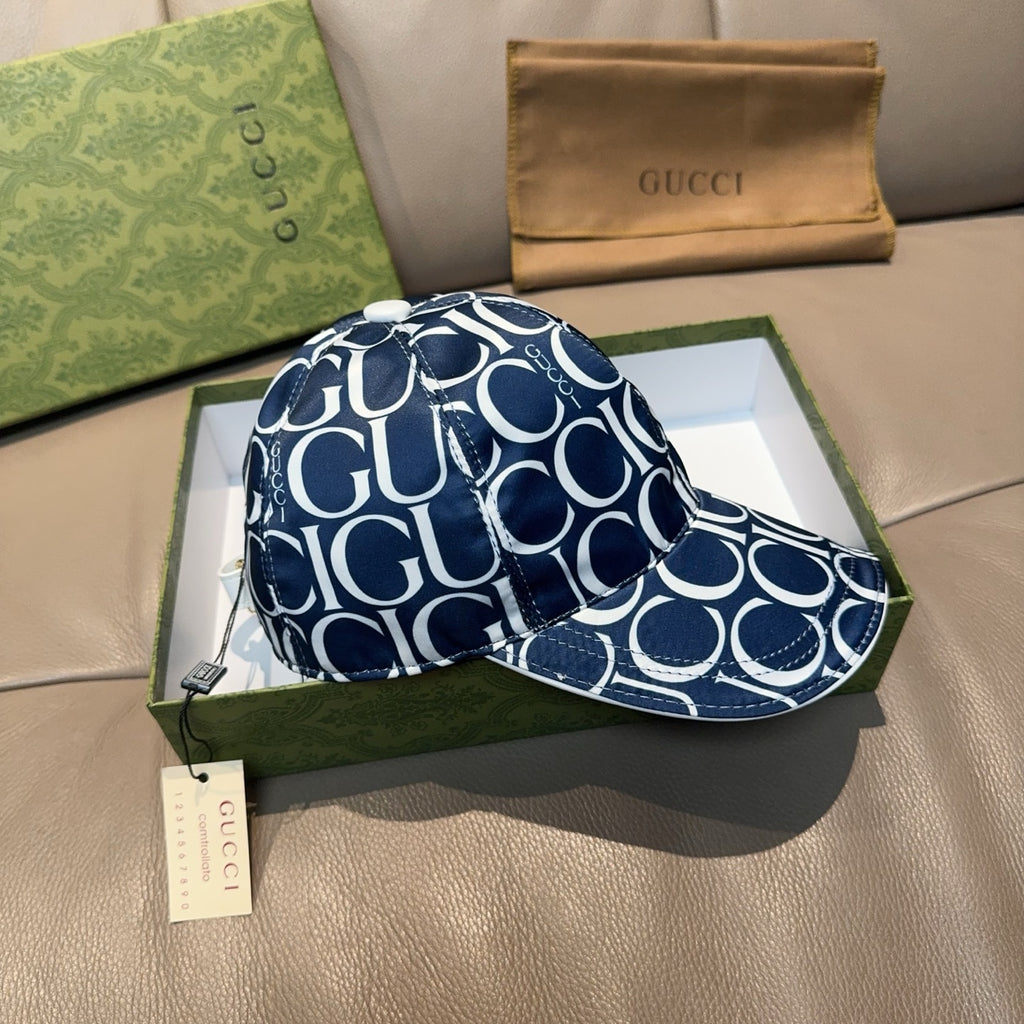 Gucci baseball cap angled view in navy GG monogram with curved brim and stitching