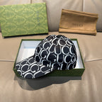 Gucci cap with black-and-white GG monogram print and curved brim