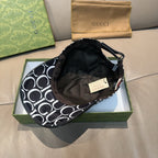 Gucci cap shown from inside, with black lining and black-and-white GG logo exterior