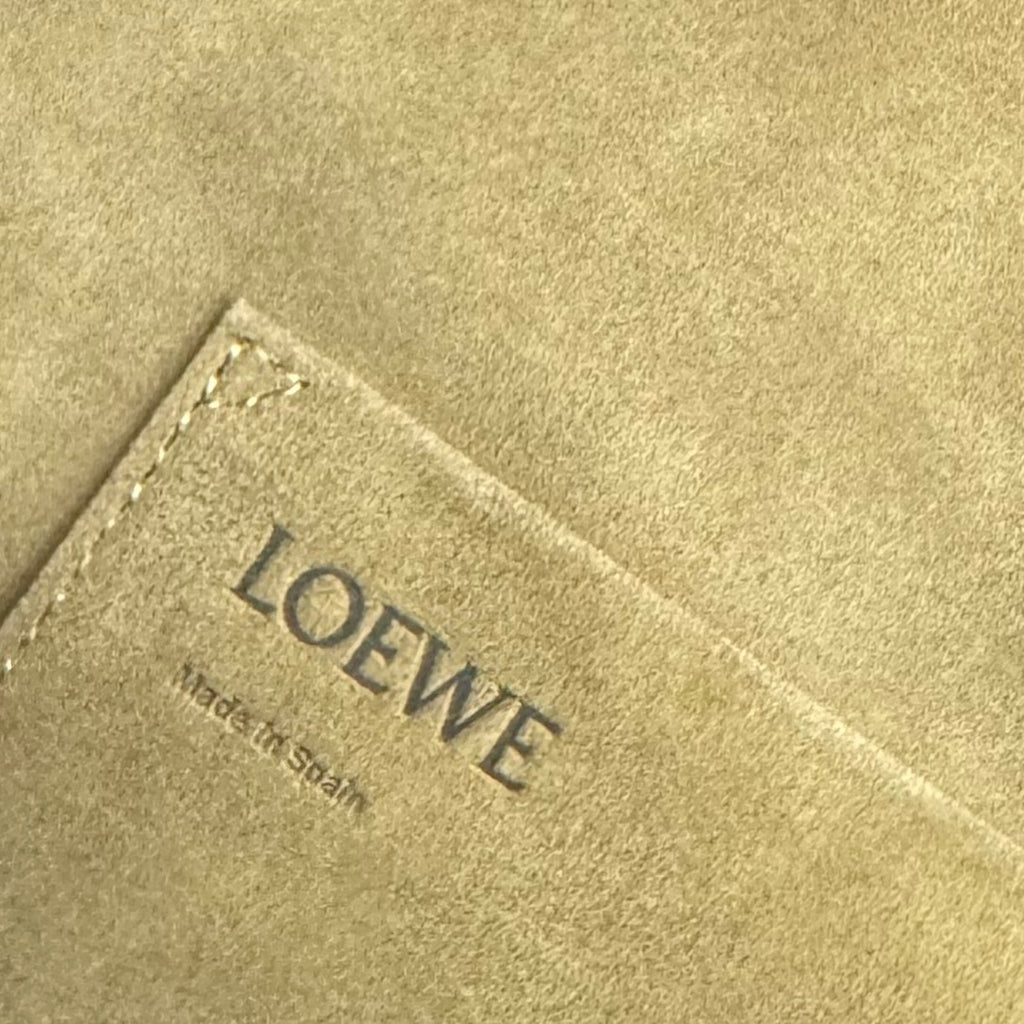 Loewe suede interior label with LOEWE logo text and Made in Spain mark