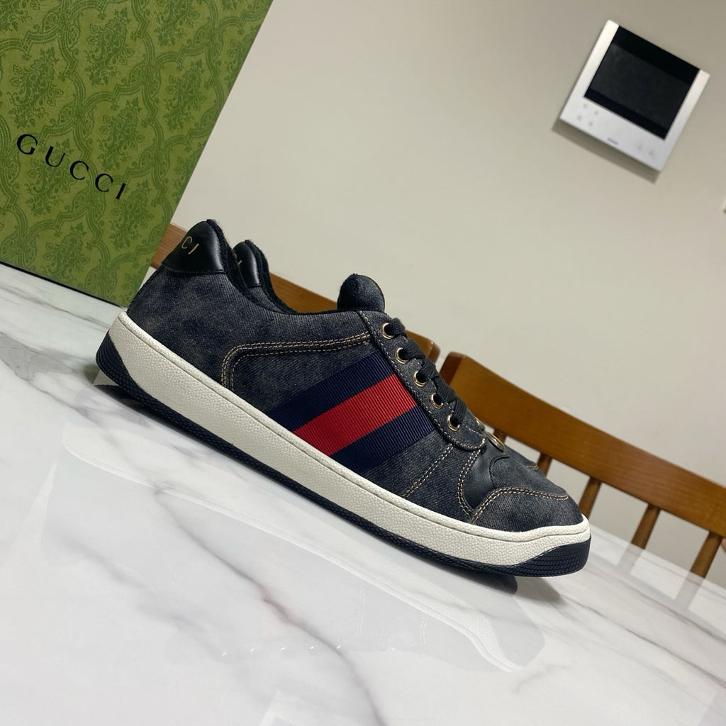 Gucci unisex denim sneakers, dark blue side profile with red-and-blue stripe band, white sole