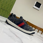 Gucci unisex denim sneakers, dark blue side profile with red-and-blue stripe band, white sole