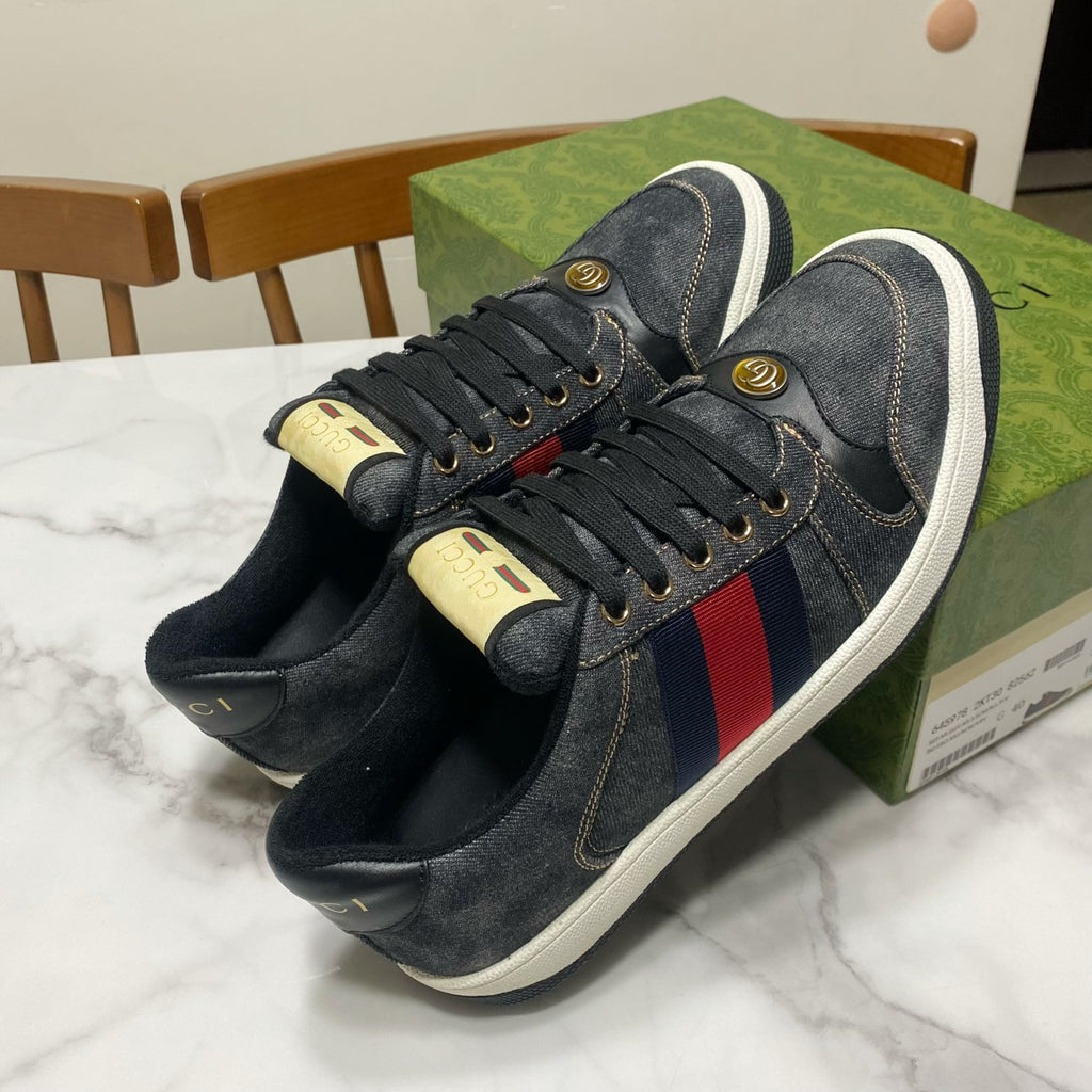 Gucci unisex denim sneakers, dark blue with red-and-blue stripe detail, gold-tone hardware