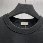 Black crewneck short-sleeve T-shirt with ribbed collar and neck tag