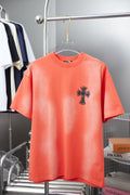 Coral short-sleeve T-shirt with navy cross logo on chest