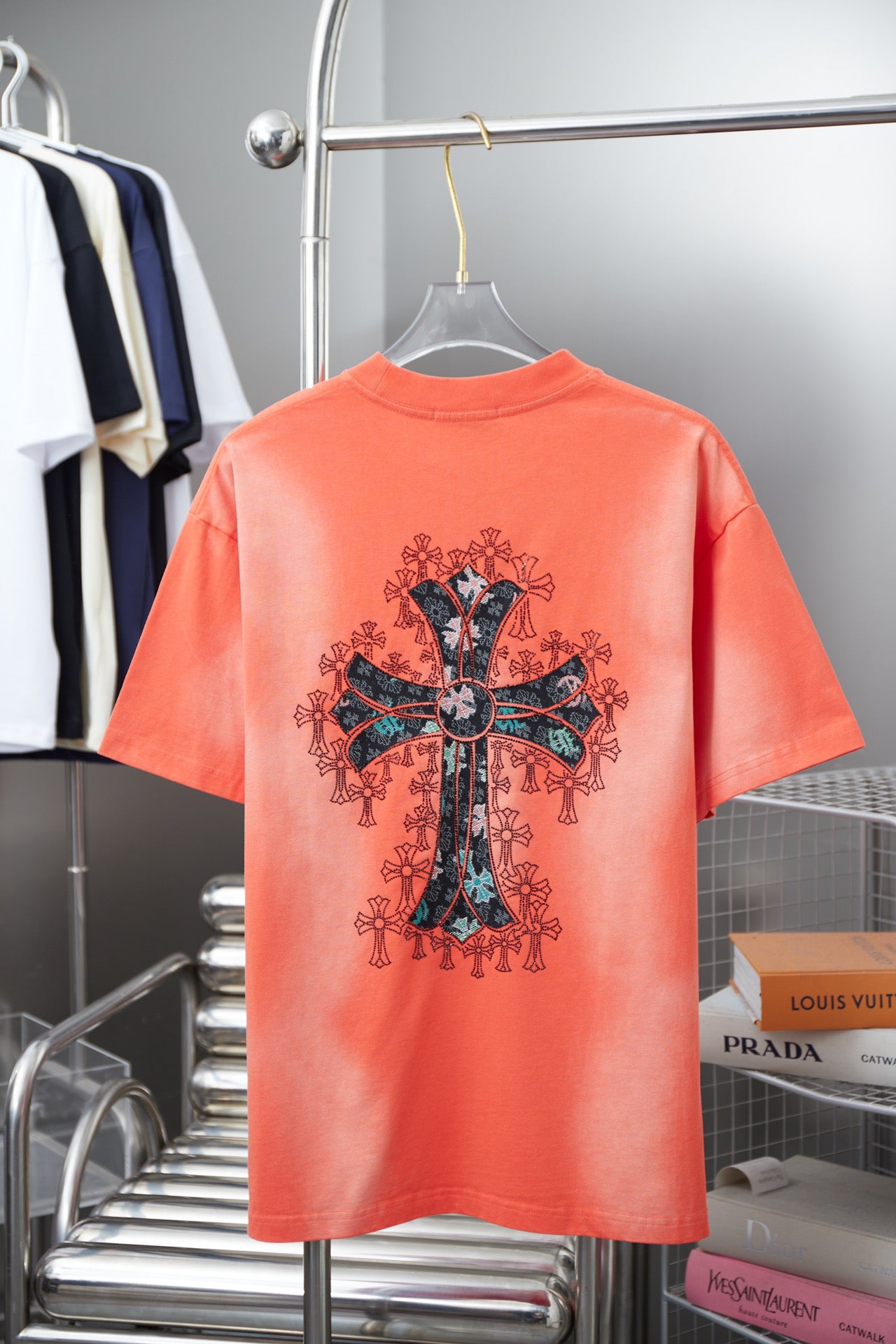 Coral short-sleeve T-shirt with large cross graphic on back