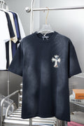 Dark short-sleeve T-shirt with small cross logo on the chest.