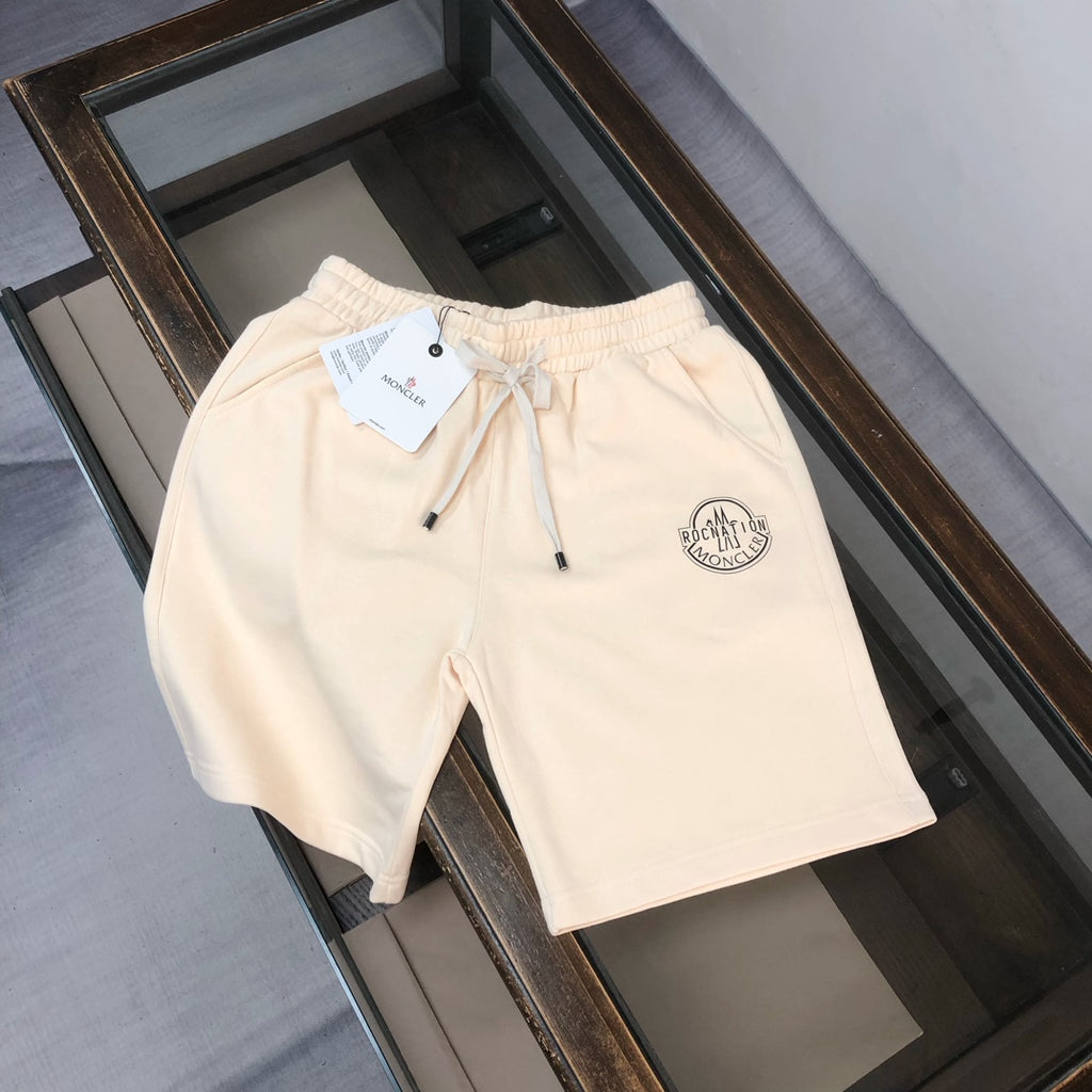 Cream drawstring shorts with front embroidered logo