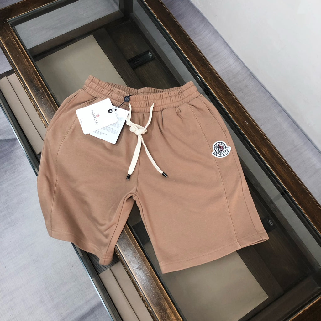 Stone Island drawstring shorts in light tan, elastic waist and side logo patch