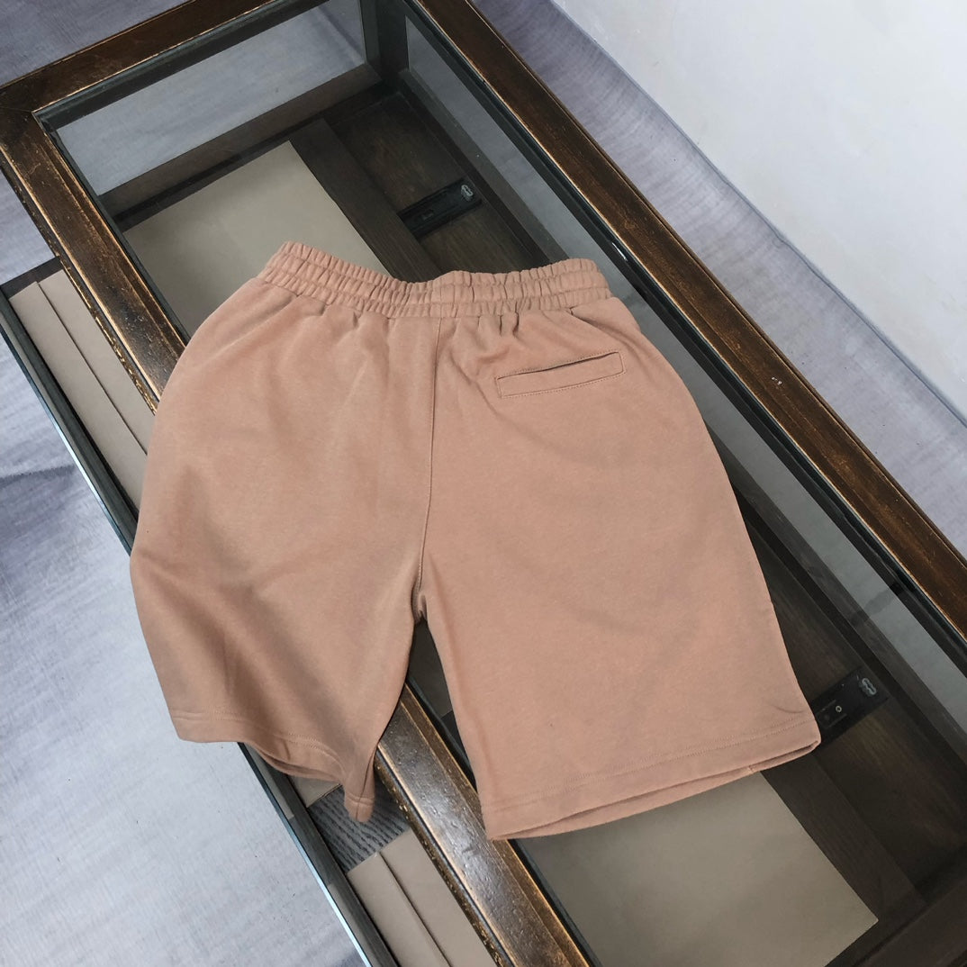 Stone Island back view drawstring shorts in light tan with elastic waistband