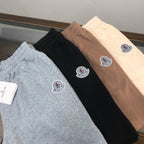 Stone Island shorts assortment: gray, black, and light tan with round logo patches