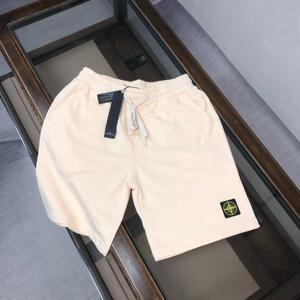 Cream drawstring shorts with elastic waistband and Stone Island logo patch