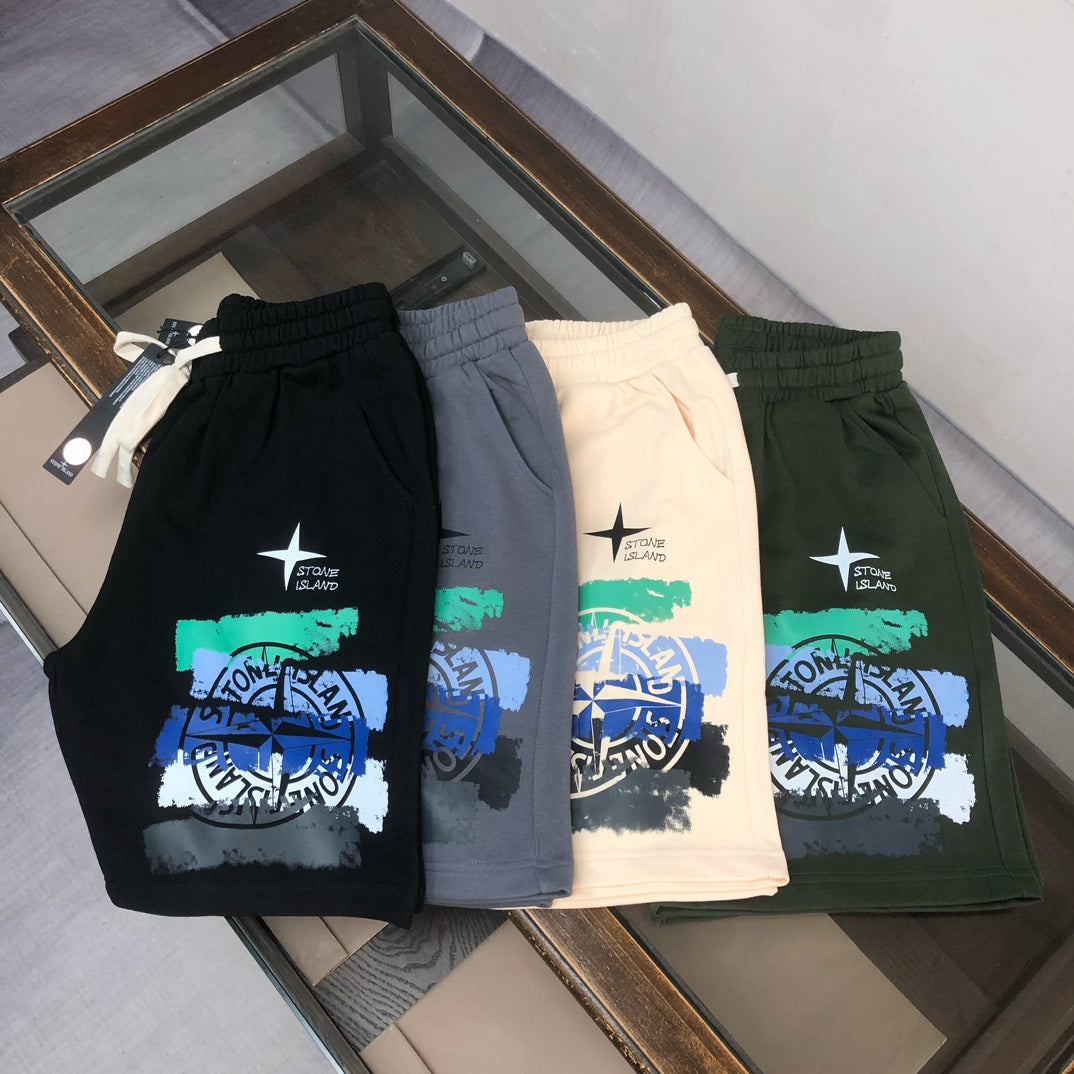 Stone Island shorts display: black, light gray, cream, and dark green