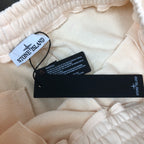 Stone Island shorts with inner tag and black logo label on waistband