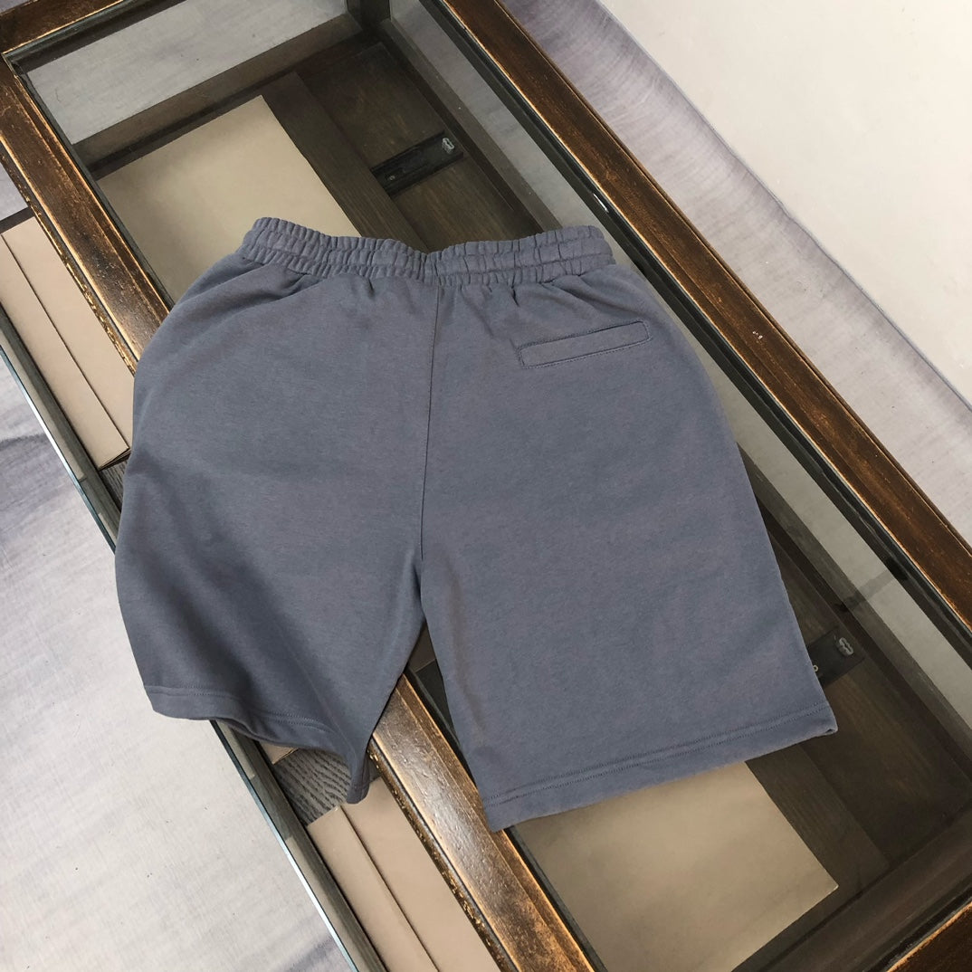 Stone Island grey shorts with elastic waistband and white drawstring