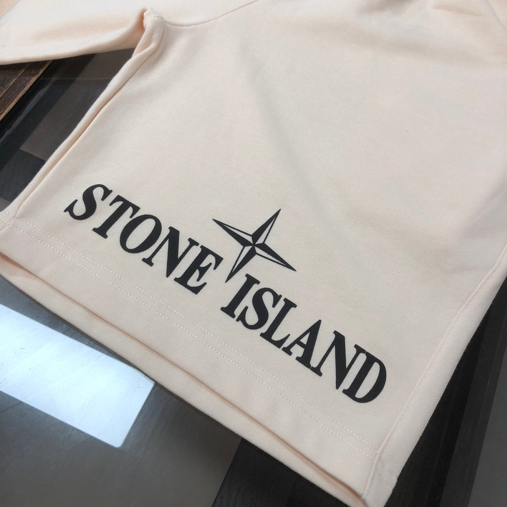 Stone Island off-white shorts with large front logo print